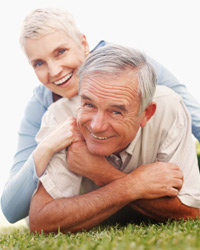 A health looking and smiling mature couple without age spots, liver spots, sunspots and brown spots on their skin.