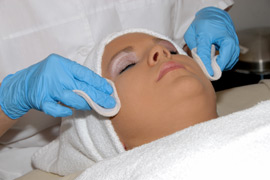 Woman getting a chemical peel at a spa